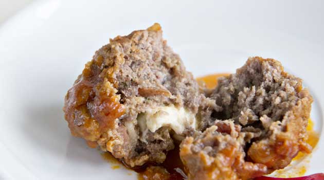 Recipe for Bacon Cheeseburger Meatballs - A simple & easy meatball recipe for your next game day party or tailgate. Bacon cheeseburger meatballs are a perfect finger food for football fans!