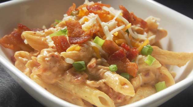 Recipe for BBQ Chicken and Bacon Pasta - It’s smokey and creamy and cheesy. It’s pure comfort food, and something that this barbecue-loving family will be indulging in frequently.
