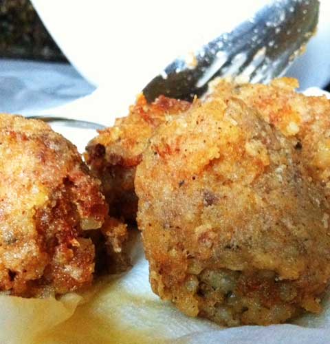 It’s one of the most delicious things we have in Louisiana. You can certainly eat it all alone, but these Louisiana Boudin Balls make great appetizers, or they’ll work as a side to another dish.