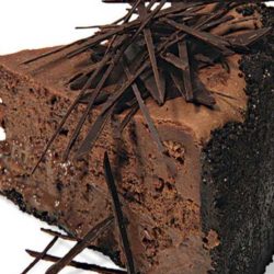 You can’t get more chocolate than this Extreme Chocolate Cheesecake: a chocolate-wafer crust, melted dark chocolate in the filling, and chocolate shards scattered over the top.