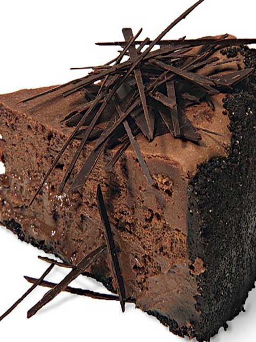 You can’t get more chocolate than this Extreme Chocolate Cheesecake: a chocolate-wafer crust, melted dark chocolate in the filling, and chocolate shards scattered over the top.