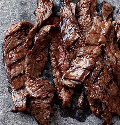This succulent Korean Sizzling Beef recipe is based on bulgogi, a classic Korean dish of sliced beef that’s marinated in soy sauce, sugar, sesame oil and garlic, then grilled.