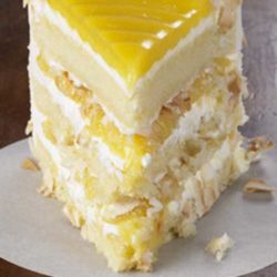 Tangy lemon filling between layers of tender white cake. Top it all off with a rich coconut-cream cheese frosting. Some people think that this Lemon Coconut Cake is the best cake they've ever eaten.