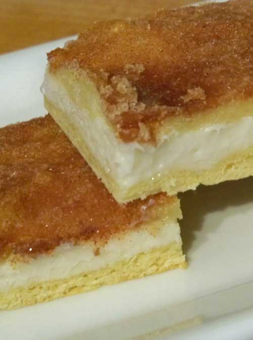 Recipe for Sopapilla Cheesecake Bars - This is a South Texas favorite. Everytime I make them, they disappear faster than you can say “hola”