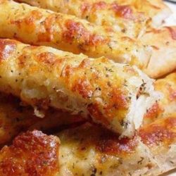 Recipe for Easy Cheesy Breadsticks - These are so simple and a quick fix for guests that may drop in.