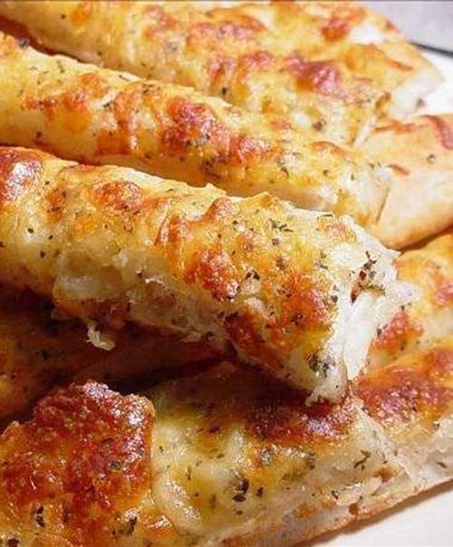 Recipe for Easy Cheesy Breadsticks - These are so simple and a quick fix for guests that may drop in.