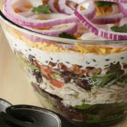 Recipe for Layered Southwest Salad - Layer this salad in a beautiful clear glass bowl for the best “wow” factor. It looks great and tastes terrific. Just mix and match the flavors to match your family’s taste.
