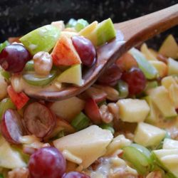 Recipe for Crunchy Apple and Grape Salad - Apples & grapes teamed up with crunchy almonds and walnuts, mixed with a cinnamon-y yogurt sauce. This is one great salad!