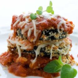 Recipe for Baked Eggplant Parmesan - These crisp, cheesy eggplant slices are a lighter take on the more traditional fried eggplant Parmesan.