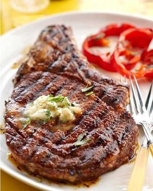 Recipe for Cowboy Rib Eye Steak and Whiskey Butter - When it's nice outside, you can not go wrong with a perfectly grilled steak. And these rib eyes with whiskey butter are to die for. It's like meat heaven on a plate.