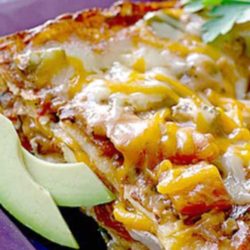 Recipe for Enchilada Lasagna - It’s our classic one-dish wonder. This Mexican casserole is like a big fat lasagna, with layers of tortillas instead of the traditional noodles.