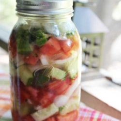 When it comes to classic summer salads, it's hard to beat this Marinated Cucumbers Onions and Tomatoes recipe...It just tastes like summer! This particular recipe is from Womack House, a long ago country kitchen in Fulshear, TX.