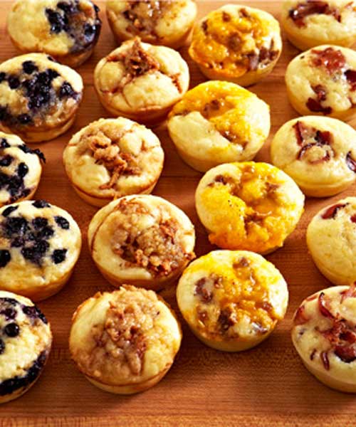 Recipe for Baked Pancake Muffins - A great make-ahead recipe for easy snacking, breakfast on the go, or packed with a side of maple syrup, these muffins are ideal for school lunches. Customize the add-ins to suit your family’s tastes.