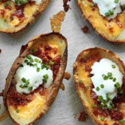 Recipe for Easy Potato Skins - Whether you have these for dinner or serve them at your next party, there’s nothing quite as satisfying as a crispy potato skin loaded with bacon and cheese, served with a cold beer.