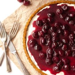 Recipe for Cherry Delight - The Best Unbaked Cherry Cheesecake Ever - Graham cracker crust, simple cream cheese filling, topped off with cherry pie filling. Easy, fast, basic. To anyone else it’s just another no-bake cheesecake, nothing special. To us it’s an institution, a tradition, a phenomenon.