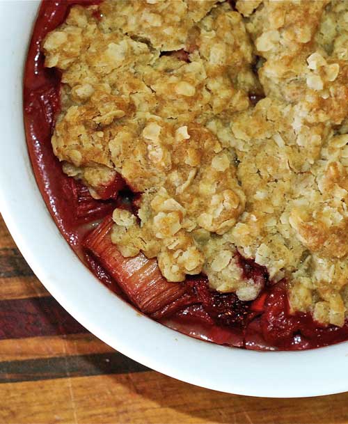 Recipe for Strawberry Rhubarb Crisp - The rolled oats really add a great heartiness to the dish, and a big scoop of vanilla ice cream is the ultimate finishing touch. You’ll notice that this recipe also calls for rhubarb, however, I left it out completely.