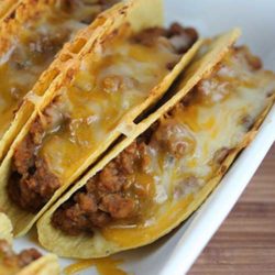 Recipe for Baked Tacos - I never thought about baking tacos in the oven before but it makes perfect sense. I really enjoyed how everything was warm and the cheese was melted.