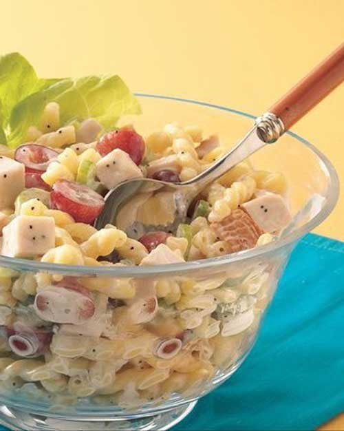 Recipe for Chicken Pasta Salad with Poppy Seed Dressing - Save time with deli chicken and prepared dressing to create this satisfying pasta salad.