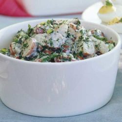 Recipe for Creamy Red Potato Salad with Lemon and Fresh Herbs - Sometimes you just want something different.. Red Potatoes are lower in starch than Yukon Golds or Russets, baby red potatoes hold their shape when tossed.