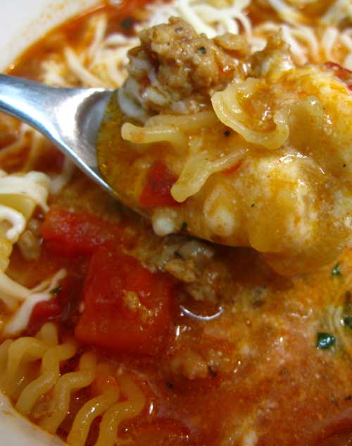 Recipe for Lasagna Soup - The soup is truly like lasagna in a bowl. The flavors are lovely. And the cheesy concoction that gets hot soup ladled over it in your bowl is yum!