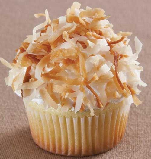 Recipe for Lime Cupcakes with Coconut Fluff Icing - The lime cupcakes are a delicious contrast between tart lime and mellow coconut icing.