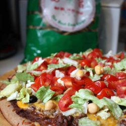 Recipe for Mexican Pizza - When I need a quick and easy dinner, I make these satisfying pizzas that capture the flavor of Mexico.
