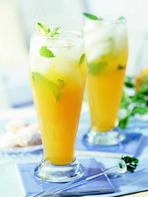 Recipe for Peach Mint Green Tea - Peach nectar and mint flavor green tea in this refreshing sweetened summer drink recipe.