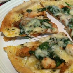 Recipe for Chicken and Spinach Pita Pizzas - Having taken logic I can determine that a Long day equals quick meal. Therefore, pita pizzas equal delicious.