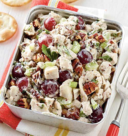Recipe for Poppy Seed Chicken Salad - Go tropical and substitute chopped pineapple for the grapes and macadamia nuts for the pecans. Stir in about 1/2 cup coconut for more island flavor.