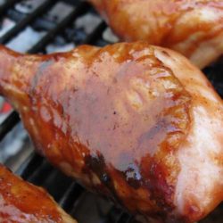 Recipe for BBQ Chicken Drumsticks Wrapped in Bacon - This is the PERFECT recipe for grilled chicken. It is my goto almost everytime we fire up the grill.