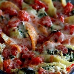Recipe for Italian Stuffed Shells - This is really pretty easy to make and true Italian comfort food! It is a great twist on traditional lasagna.