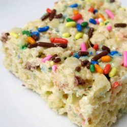 Recipe for Cake Batter Rice Krispie Treats - This recipe brings back a favorite sticky childhood treat, and the fun of licking the cake batter spoon.