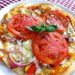 Recipe for California Tortilla Pizzas - What a great lunch to treat everyone on a summer afternoon, tweens have friends over they can make this to impress their friends, way better than microwave pizza!