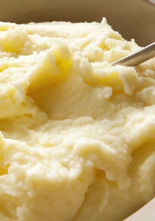 Tried and true Lighter Creamy Garlic Mashed Potatoes- and no one will notice the difference, they taste just as good as the ones with all the extra fat!