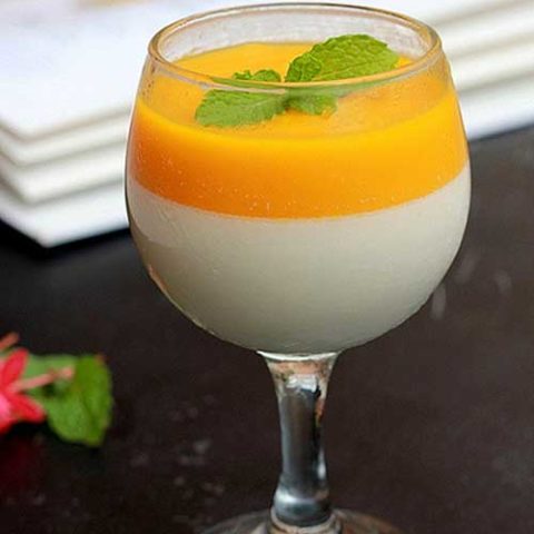 Here is an elegant dessert that will wow a crowd. This Mango Panna Cotta's looks and taste are beyond elegant, but the preparation could not be any easier.