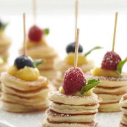 These Mini Pancake Stacks would be a cool way to display breakfast in the morning for guests or for a shower!