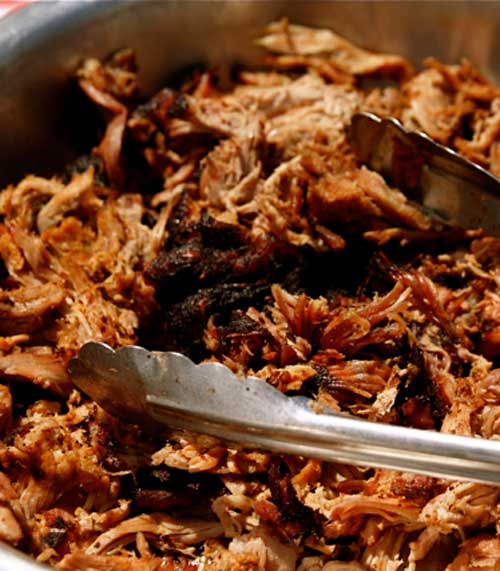 Recipe for Easy Crock Pot Pulled Pork Barbecue Sandwiches - Skip the drive-thru and make a batch of these super simple sandwiches for an easy dinner.
