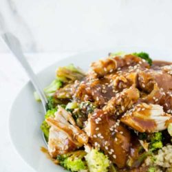 Recipe for Slow Cooker Sesame Garlic Chicken - This slow cooker sesame garlic chicken reminds me of a teriyaki chicken dish that a local Hawaiian restaurant serves. But now when I have a craving, I can make this, and it’s a lot cheaper too!