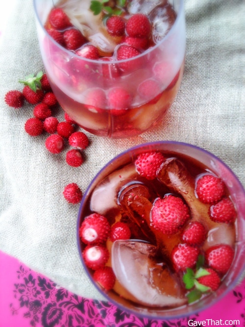 Recipe for Wild Strawberry Fizz - Muddled a bit and mingling with rum, these strawberries make for a great fizz. Or ditch the rum for a refreshing summer drink!