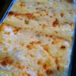 Recipe for White Chicken Enchiladas - Chicken enchiladas with green chili sour cream sauce. It is seriously even better than it looks!
