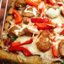 Recipe for Grilled Sausage and Pepper Pizza - Pizza on the grill is really easy with Pillsbury pizza crust. Top with turkey sausage, bell pepper and cheese; it’s delicious!