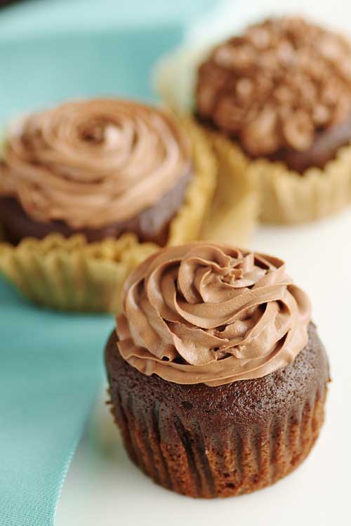 Recipe for Kahlua Cupcakes with Kahlua Chocolate Mousse Frosting - Kahlua and chocolate, two flavors that are perfect on their own. Combine the two and...good luck not eating all of these cupcakes on your own.