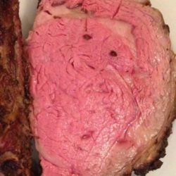 Feast like a king with a paupers budget with this recipe for Prime Rib On A Budget. This roast is cooked up to taste just like prime rib, and at a quarter of the price! So tender, so delicious!