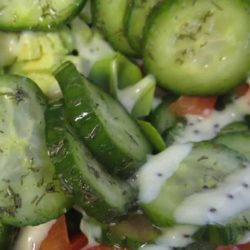 Recipe for Cucumber Garden Salad - This light and delicious salad is just perfect. Make some extra, and enjoy the leftovers for lunch the next day!