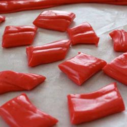 Recipe for Homemade Laffy Taffy - Sticky, chewy, salty, and sweet; all can be used to describe taffy. Little pieces of chewy delight individually wrapped in wax paper.