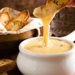 Can you think of anything else better on Earth than warm, melty, gooey Gouda Cheese Fondue? I didn't think so!