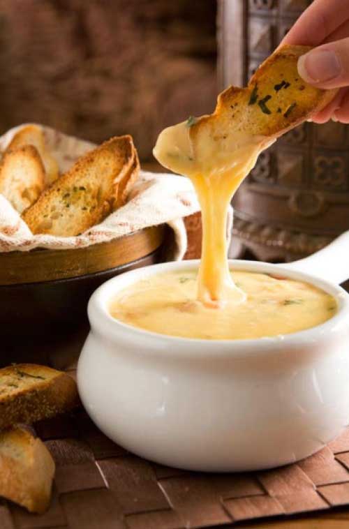 Can you think of anything else better on Earth than warm, melty, gooey Gouda Cheese Fondue? I didn't think so!