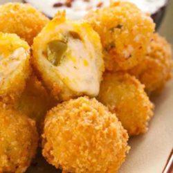These Jalapeno Cheese Fritters are the ultimate appetizer. Gooey cheese and jalapenos in a crunchy shell. What more could you want? - A copycat recipe from Abuelo’s Mexican Food Embasy.. YUM!!