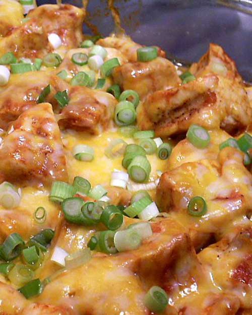 This Mexican Chicken makes a simple, tasty supper. It would be especially easy if you had leftover cooked chicken. It's really good served with Mexican Rice.
