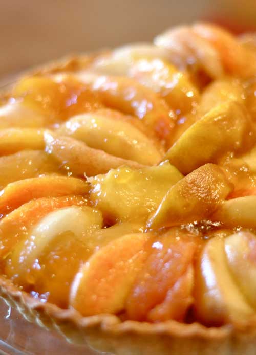 I picked up a small basket of peaches on Saturday and let them get just ripe enough to bake with. So, today was the day and Peach Tart is what’s for dessert!